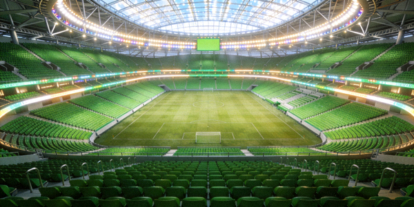 现代化的世界杯体育场内部全景，座椅为绿色调